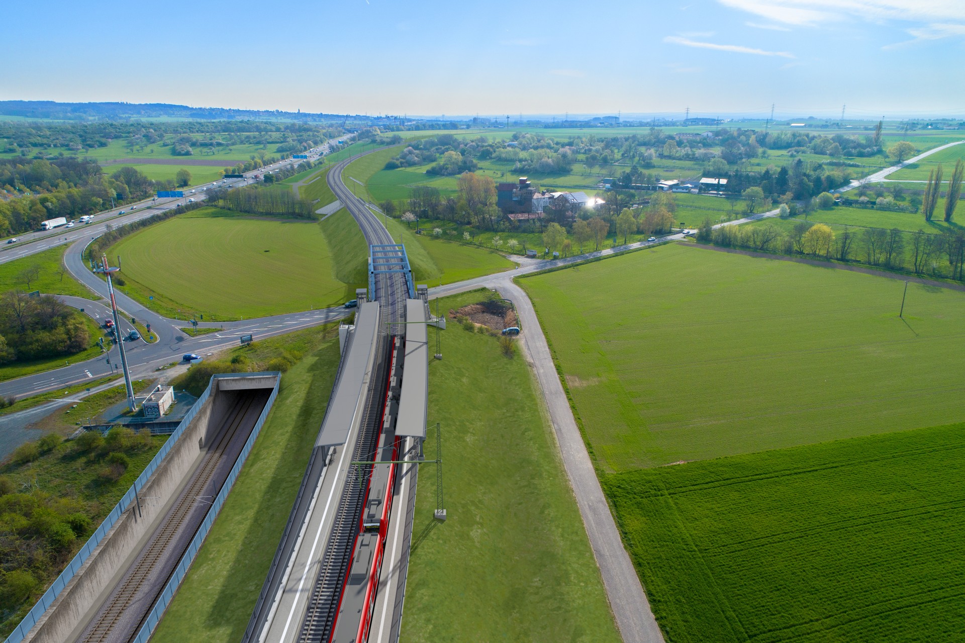 Der Tunnel wird rechts durch zwei weitere Gleise mit Haltepunkt Wallau/Delkenheim erweitert.